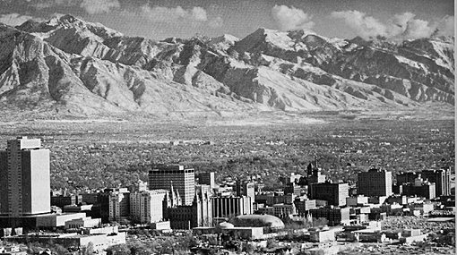 Near-horizontal view of Salt Lake City and the Wasatch Front mountains east of the city.
