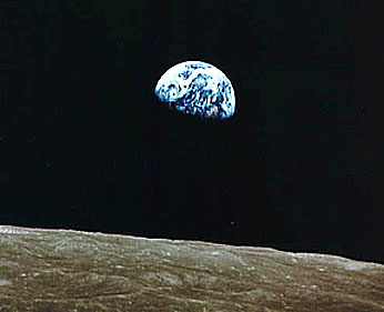 The rising Earth as seen from the Moon during the Apollo 8 circumlunar mission; photographed by an astronaut.
