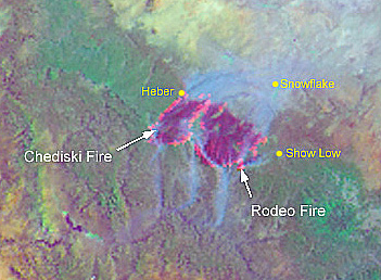 Fires in the pinewoods of Arizona, near Show Low, as seen in a subset taken from a NOAA-15 image, acquired around June 22, 2002.