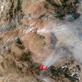 NOAA-15 image of parts of northeast Arizona, southeast Utah, and Colorado, showing two areas experiencing major fires in June, 2002.
