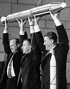 From right to left: W. von Braun; J. Van Allen; W. Pickering, all holding the Explorer 1 model.