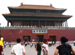 Beijing. One of the main gates in to the Forbidden City dwarfing the plazas stretching out before them