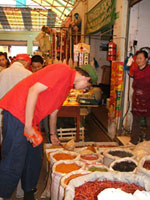 One of our students, Hugo, inspects the spices. Chillies are a big feature of Yunnan cuisine