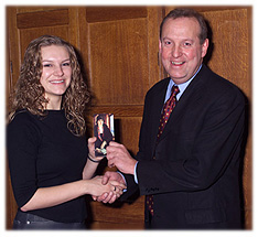 Picture of Victoria Radcliffe being presented with her prize by Dr Paul Ayris