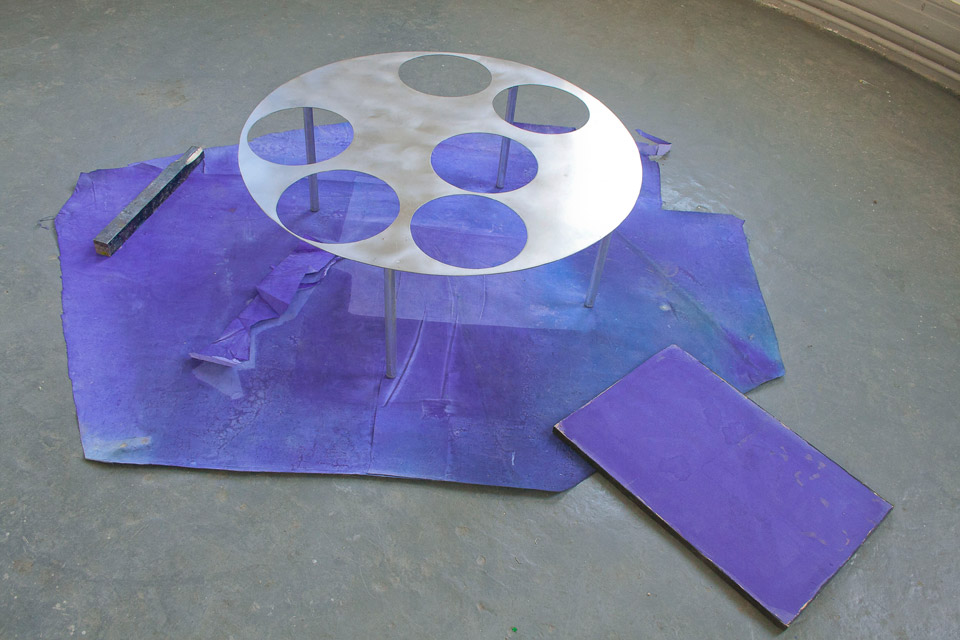 <p>Table and Floor, 2012, steel, cotton, wood, 100 cm diameter, 40 cm high, 160 x 200 cm</p>