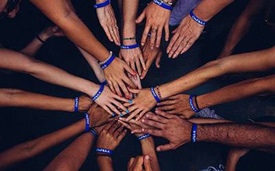 Hands together in a circle