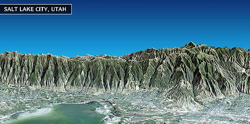 SRTM perspective image of SLC against the background of a vertically stretched Wasatch Mountains.