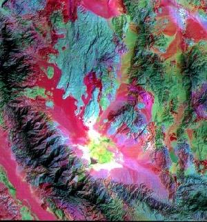 Color composite made with ASTER thermal bands showing the Saline Valley of California and surrounding mountains.
