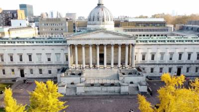 UCL Portico with yellow trees (drone view)