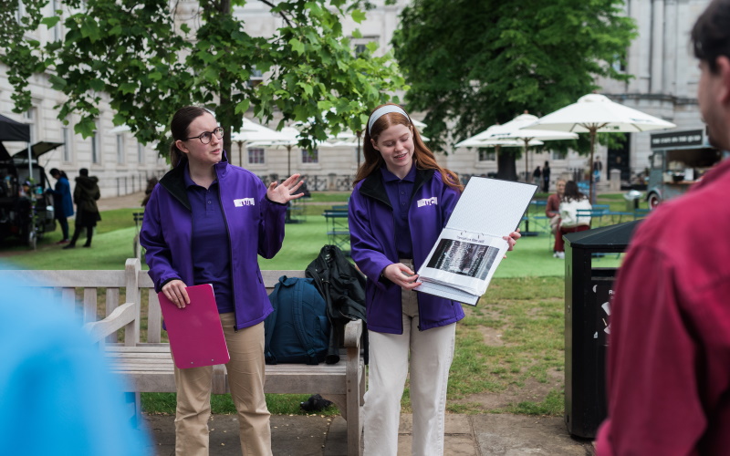 UCL walking tour guides presenting