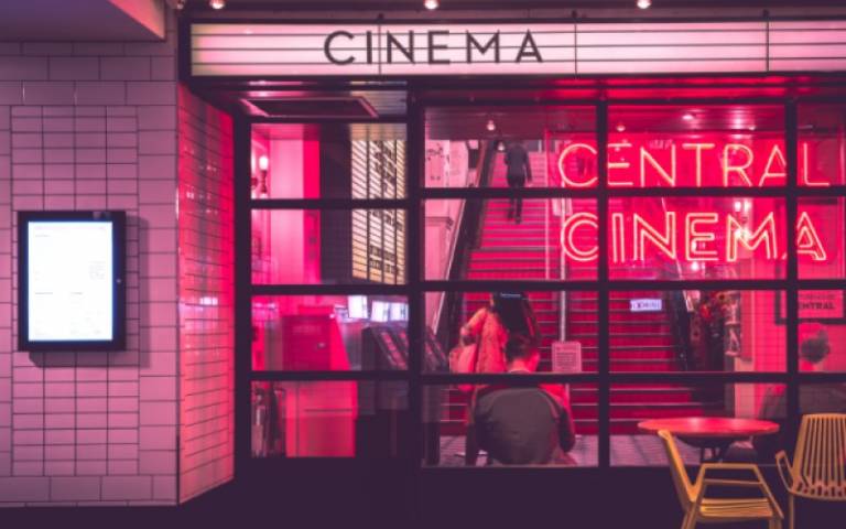 Front of a Cinema in London, lit up in pink.