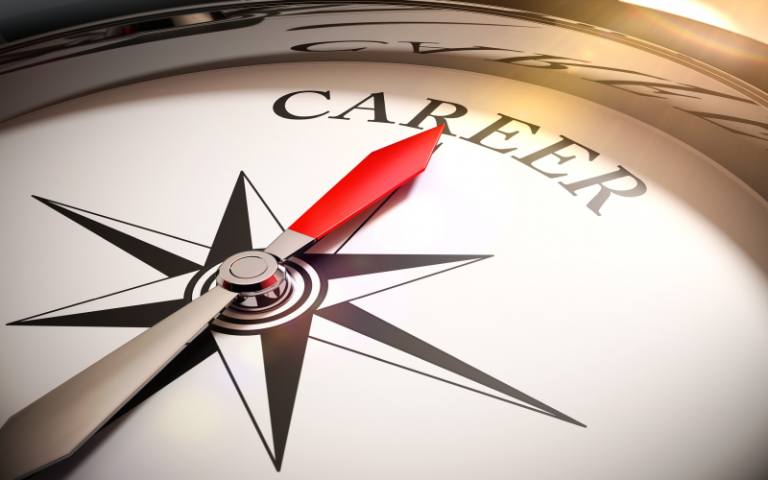 Image of a compass with the red arrow pointing towards the word career
