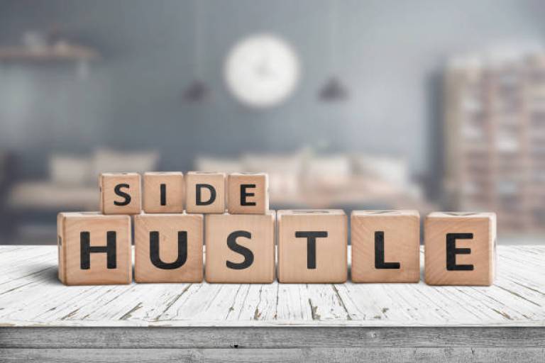 An image of wooden blocks that spell out the words Side Hustle