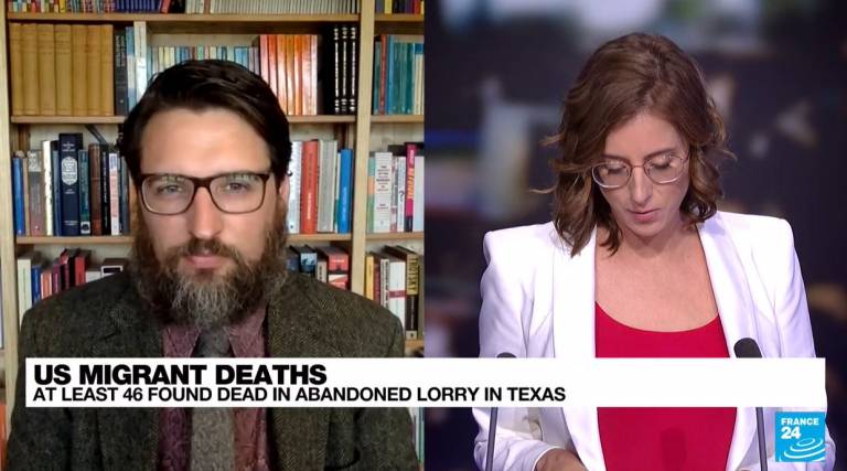 Photo still of split-screen: on the left, Dr William Booth's interview by France24, with part of his library as background; on the right, a France24 journalist