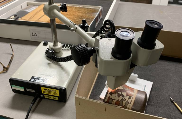 Microscope over an object in the UCL Ethnography Collection