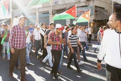 Image showing a group of Jordanian protesters marching