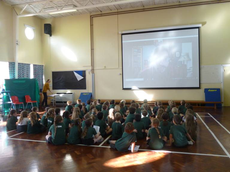 Steve on the bigscreen being watched intently by year 3 students