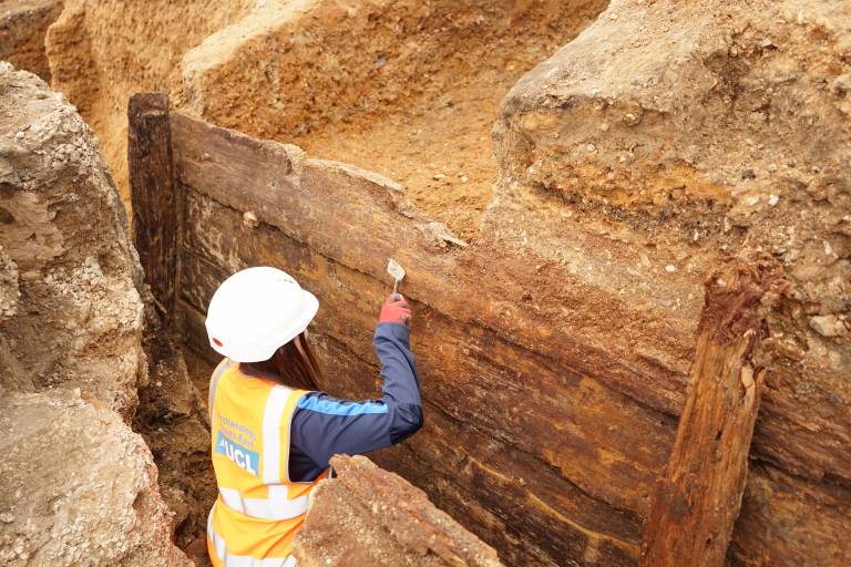 Archaeologists excavating the timber structure
