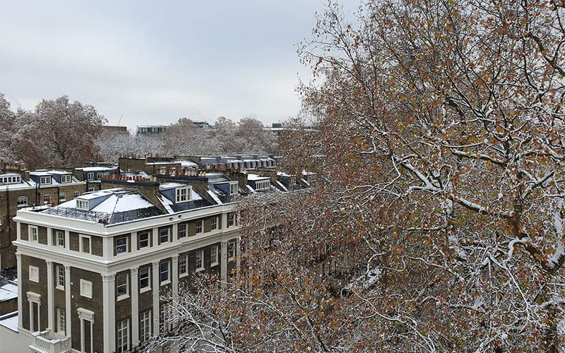 View from the UCL Institute of Archaeology to buildings of one side of Gordon Square in the snow