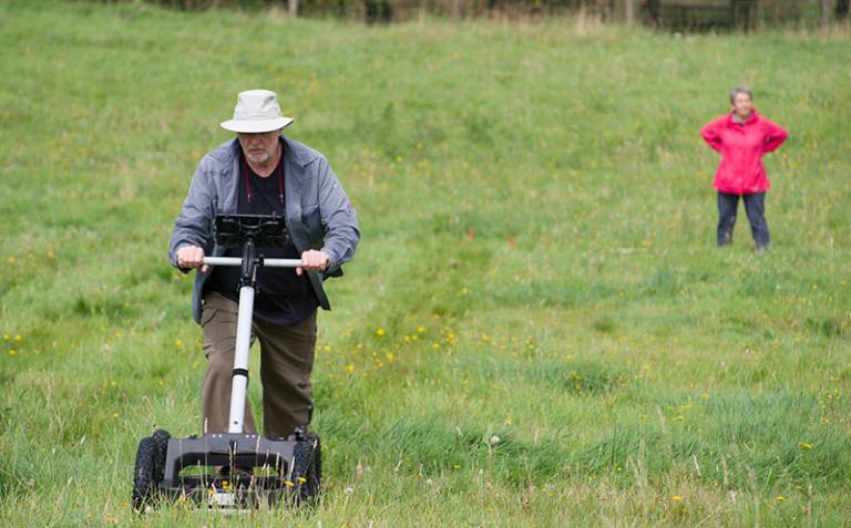 Mike Smith and Rhian Morgan from the Community Archaeology Geophysics Group conducting a GPR survey at the Roman city of Verulamium in August 2021.