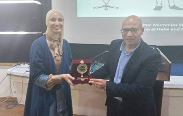 Heba Abd El Gawad being presented award by the Vice Dean for Community Services and Environment Development , Prof. Ibrahim Badr,  Must University, Cairo 