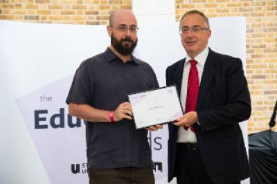 Gabriel Moshenska receiving a UCLU Student Choice Award