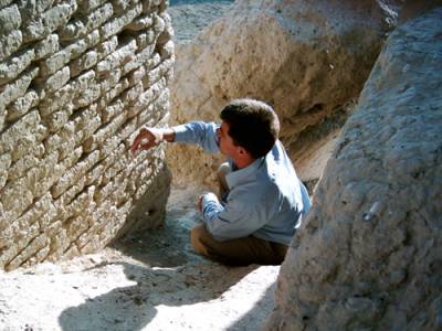 A member of the Archaeological Park undertaking a condition assessment.