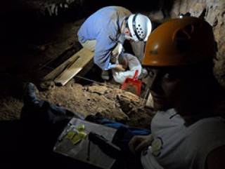 Working at the Gruta Figueira Brava cave site on Portugal's Atlantic coast (Image courtesy of Mariana Nabais)