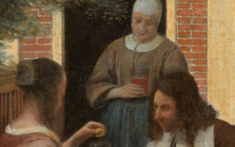 old image of person wearing bonnet and holding drink talking