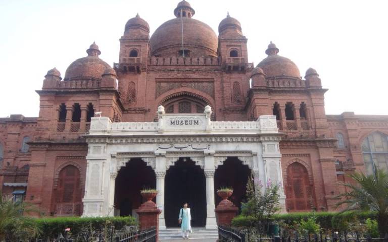 Lahore museum in Pakistan with a lady stood in front - taken by Aparna Kumar 2014