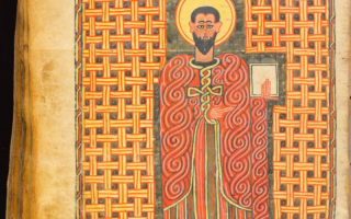 A man in a robe in a holy book