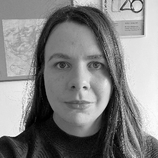 black and white shot of Dr Marta Zboralska, UCL History of Art alumni