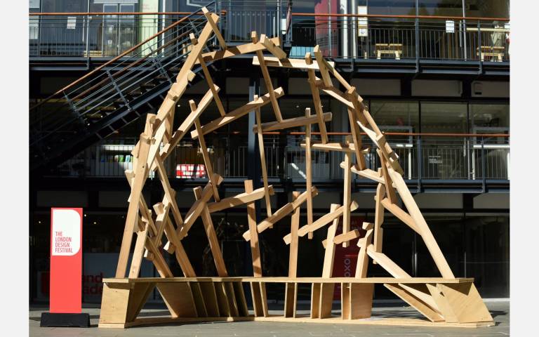 Wooden structure in front of Oxo Wharf Tower