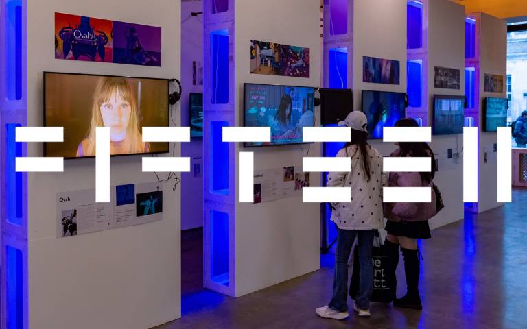 Image: Two exhibition visitors look at video screens at The Bartlett Fifteen Show