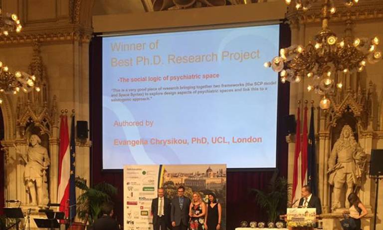 Dr Evangelia Chrystikou receives her award for best PhD Research Project