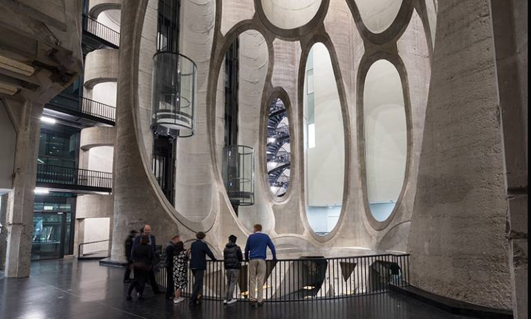 A large, cavernous atrium carved out of a stone grain silo in Cape Town. Created for the Zeitz Museum of Contemporary Art Africa by Heatherwick Studio.