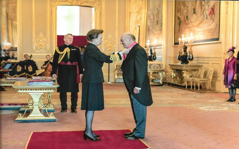 Peter Hansford receiving CBE award from Princess Anne