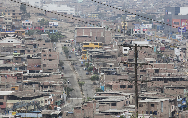 The peripheral urbanisation of Lima, Peru on the mountainous slopes at the edge of the city.
