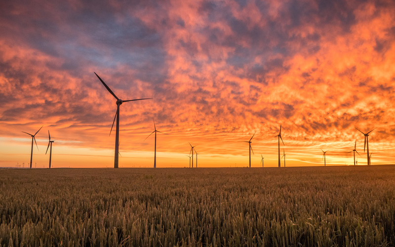 Wind turbines at sunset - Photo by Karsten Würth (@inf1783) on Unsplash