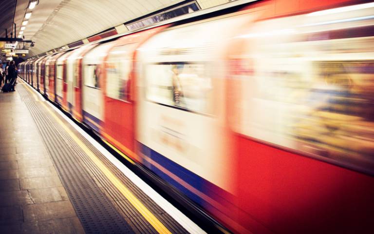 Train pulling in to London Underground station - Photo by Dan Roizer on Unsplash