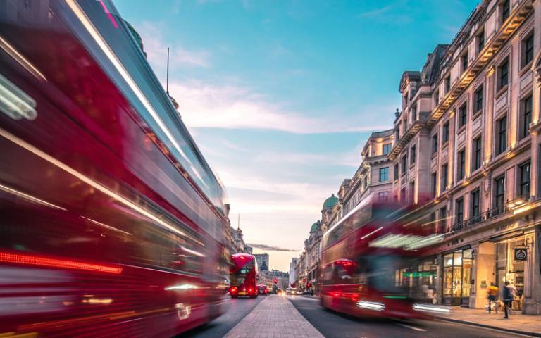 Buses on Oxford Street. Photo by Lachlan Gowen on Unsplash