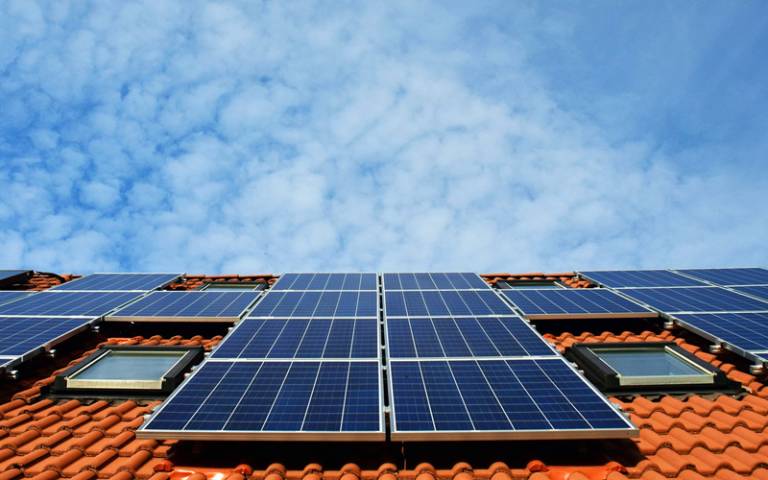 Solar panels on tiled roof - Pixabay