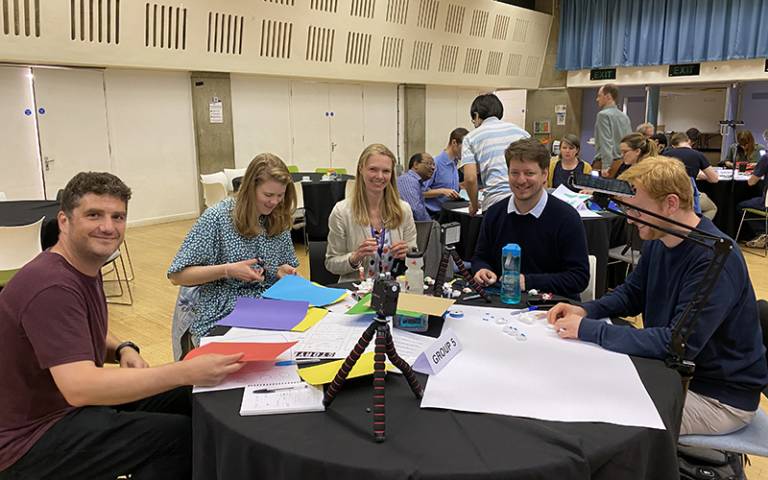 A group of UCL Energy Institute staff work on their animations at the away day
