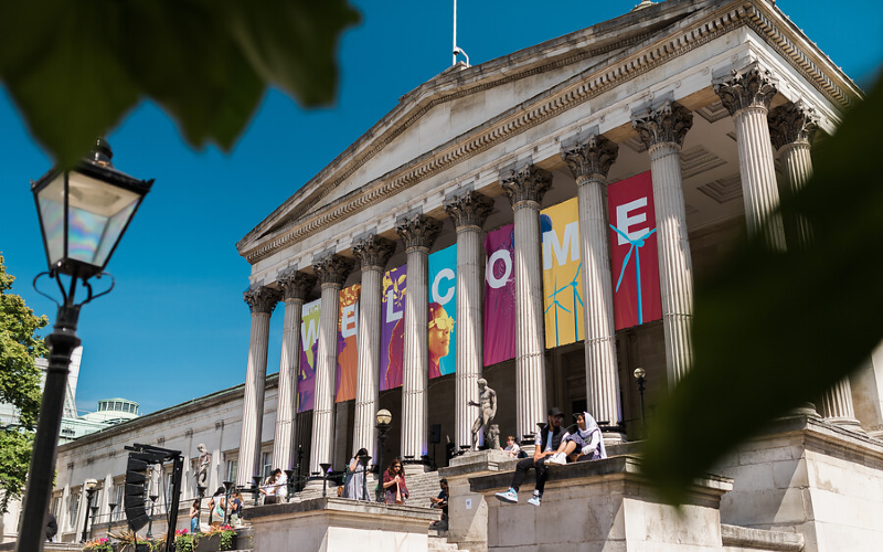 Image of the UCL portico with 'Welcome' Banners between the pillars