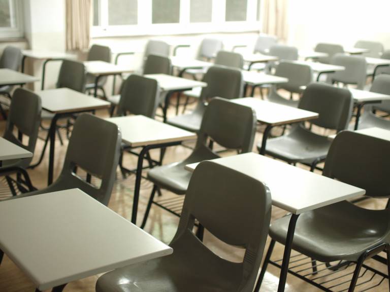 Grey school chairs in classroom