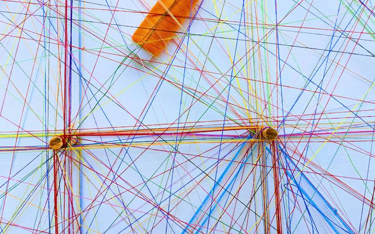 colourful string crossing over each other representing networks 
