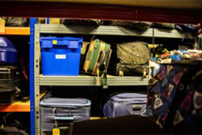 luggage in racks 
