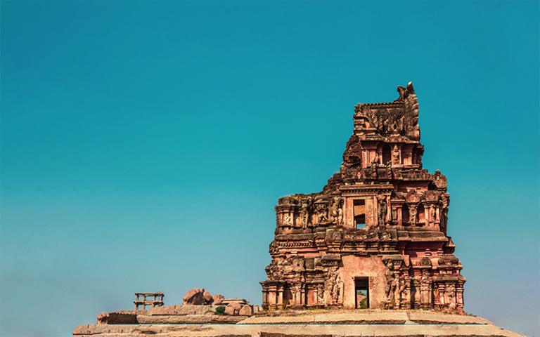 A broken spire of an ancient ruined temple in Hampi, Karnataka, India.