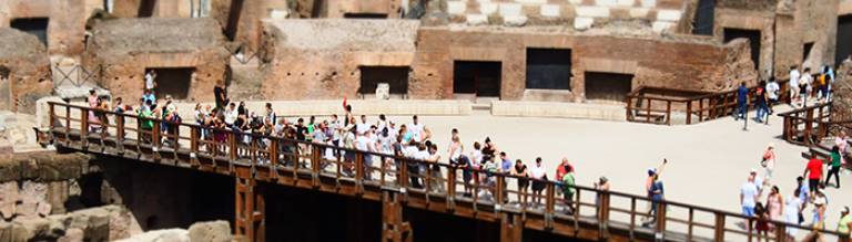 Photo of lots of people visiting a heritage site in Rome