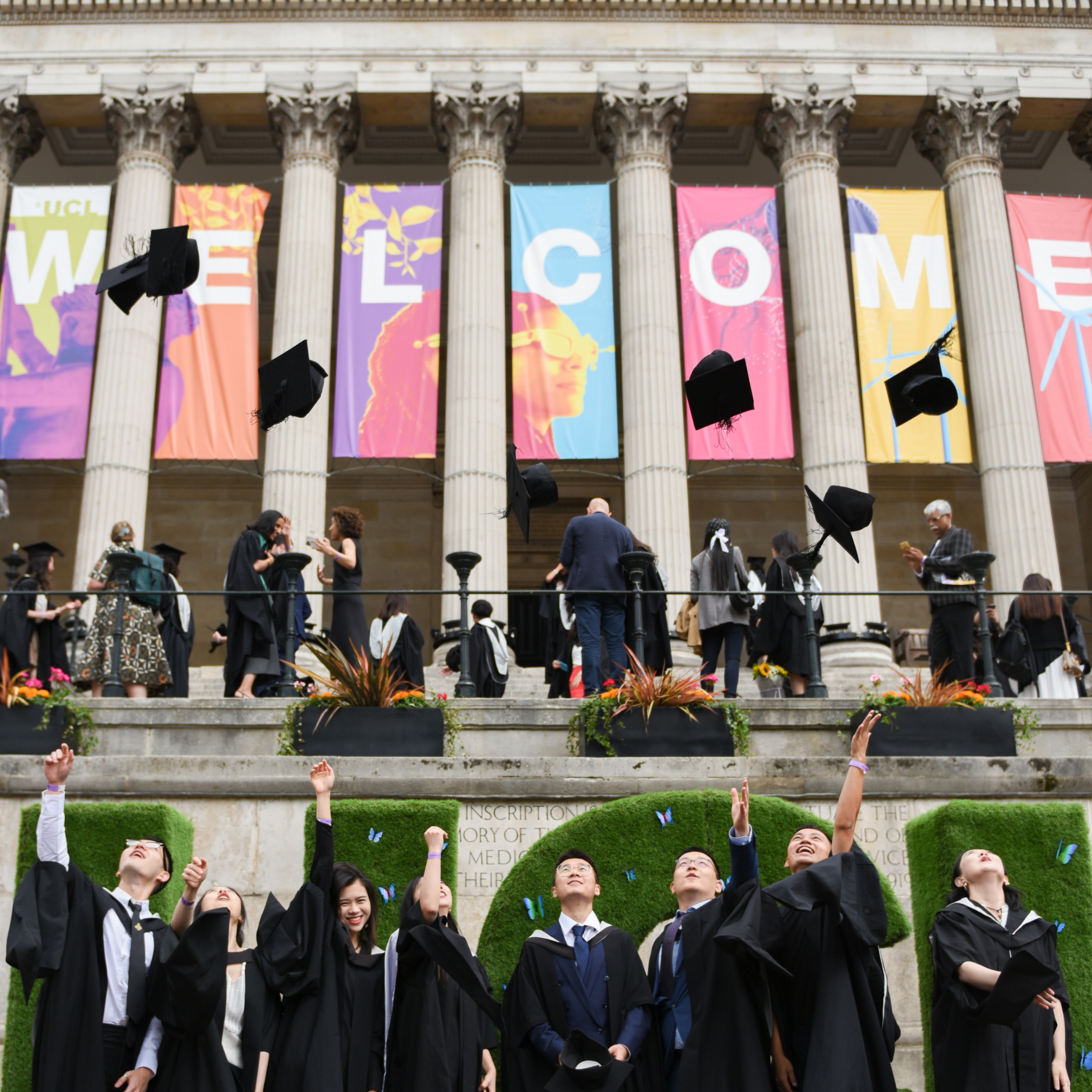 Group of graduating students in front of UCL 